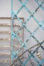 Closeup shot of old rusty wrought iron fences and railings against a white background Royalty Free Stock Photo