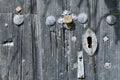 Closeup shot of an old wooden door with a metal rusted lock Royalty Free Stock Photo