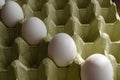 Closeup shot of a pack of white farm eggs