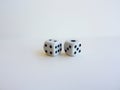 Closeup shot of a pair of dice isolated on a white background Royalty Free Stock Photo