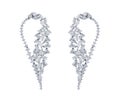 Closeup shot of a pair of silver earrings isolated on a white background