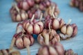 Closeup shot of peeled red garlic bulbs Royalty Free Stock Photo