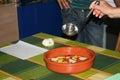 Closeup shot of people making a traditional Galician Queimada punch