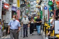 Closeup shot of people walking in Haji Lane, Singapore Royalty Free Stock Photo