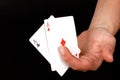 Closeup shot of a person holding two ace cards Royalty Free Stock Photo