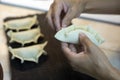 Closeup shot of a person making a delicious dumplings Royalty Free Stock Photo