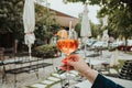 Closeup shot of a person's hand holding a glass of cocktail Royalty Free Stock Photo