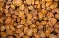 Closeup shot of a pile of raisins displayed in a grocery