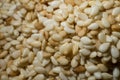 Closeup shot of a pile of sesame seeds with blur background