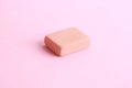 Closeup shot of a pink eraser on a pink background Royalty Free Stock Photo