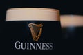 Closeup shot of a pint of Guinness beer with foam Royalty Free Stock Photo