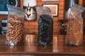 Closeup shot of plastic bags of different types of grains in the cafe