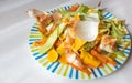 Closeup shot of a plate with vegetable peels for composting