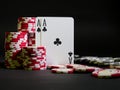 Closeup shot of poker cards and chips on a black background Royalty Free Stock Photo
