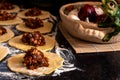 Closeup shot of the process of baking mushroom pastries in a kitchen