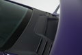 Closeup shot of a purple car\'s spoiler