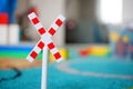 Closeup shot of a railway cross sign toy Royalty Free Stock Photo