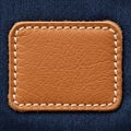 Blank Leather Patch on Blue Textile Background Royalty Free Stock Photo