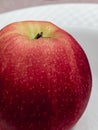 Closeup shot of a red apple with waterdrops Royalty Free Stock Photo