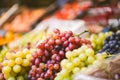 Closeup shot of red, black and green grapes next to each other in the market Royalty Free Stock Photo