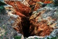 Closeup shot of red canyon rocks forming a hollow - soil erosion