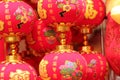 Closeup shot of red Chinese decorations with paintings of flowers