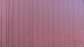 Closeup shot of red corrugated metal sheet texture background Royalty Free Stock Photo