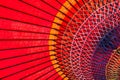 Closeup shot of a red Japanese parasol under the light Royalty Free Stock Photo