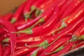 Closeup shot of red peppers one on anothe Royalty Free Stock Photo