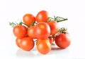 Closeup shot of a red ripe cherry tomatoes isolated on a white background Royalty Free Stock Photo