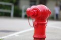 Closeup shot of a red street fire hydrant in Hong Kong on the street Royalty Free Stock Photo