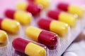 Closeup shot of red yellow capsule pills in a blister pack Royalty Free Stock Photo