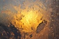 Closeup shot of the reflection of the sun on ice pattern on glass. Royalty Free Stock Photo