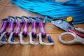 Closeup shot of rock climbing equipment under the light: ropes, quickdraws Royalty Free Stock Photo
