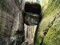 Closeup shot of rock stuck between two cliffs in Larvik, Norway