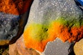 Closeup shot of a rock texture with colorful natural marks generated by ai