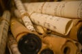 Closeup shot of rolled-up sheets of vintage music songs scrolls with different notes