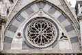 Closeup shot of a round window with a stone lattice of the Santa Maria Della Spina church in Pisa Royalty Free Stock Photo