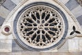 Closeup shot of a round window with a stone lattice of the Santa Maria Della Spina church in Pisa Royalty Free Stock Photo