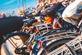 Closeup shot of a row of bicycles in parking Royalty Free Stock Photo