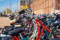 Closeup shot of a row of bicycles in parking Royalty Free Stock Photo