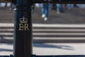 Closeup shot of the Royal Cypher of the Queen in the streets of London, United Kingdom