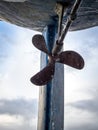 Closeup shot of a rustic vintage propeller. Royalty Free Stock Photo