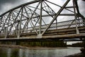 Closeup shot of a rusty bridge over a river Royalty Free Stock Photo