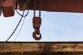 Closeup shot of the rusty chain of a crane under the sunlight at daytime