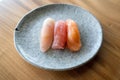 Closeup shot of salmon, tuna, and yellowtail pieces of sushi at a Japanese restaurant Royalty Free Stock Photo