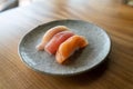 Closeup shot of salmon, tuna, and yellowtail pieces of sushi at a Japanese restaurant Royalty Free Stock Photo