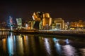 A closeup shot of scenic night cityscape of Bilbao Guggenheim Museum Royalty Free Stock Photo