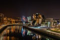 A closeup shot of a scenic night cityscape of Guggenheim Museum Royalty Free Stock Photo