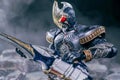 Closeup shot of SIC Kamen Rider Blade Ace Form figure on dark background filled with smoke